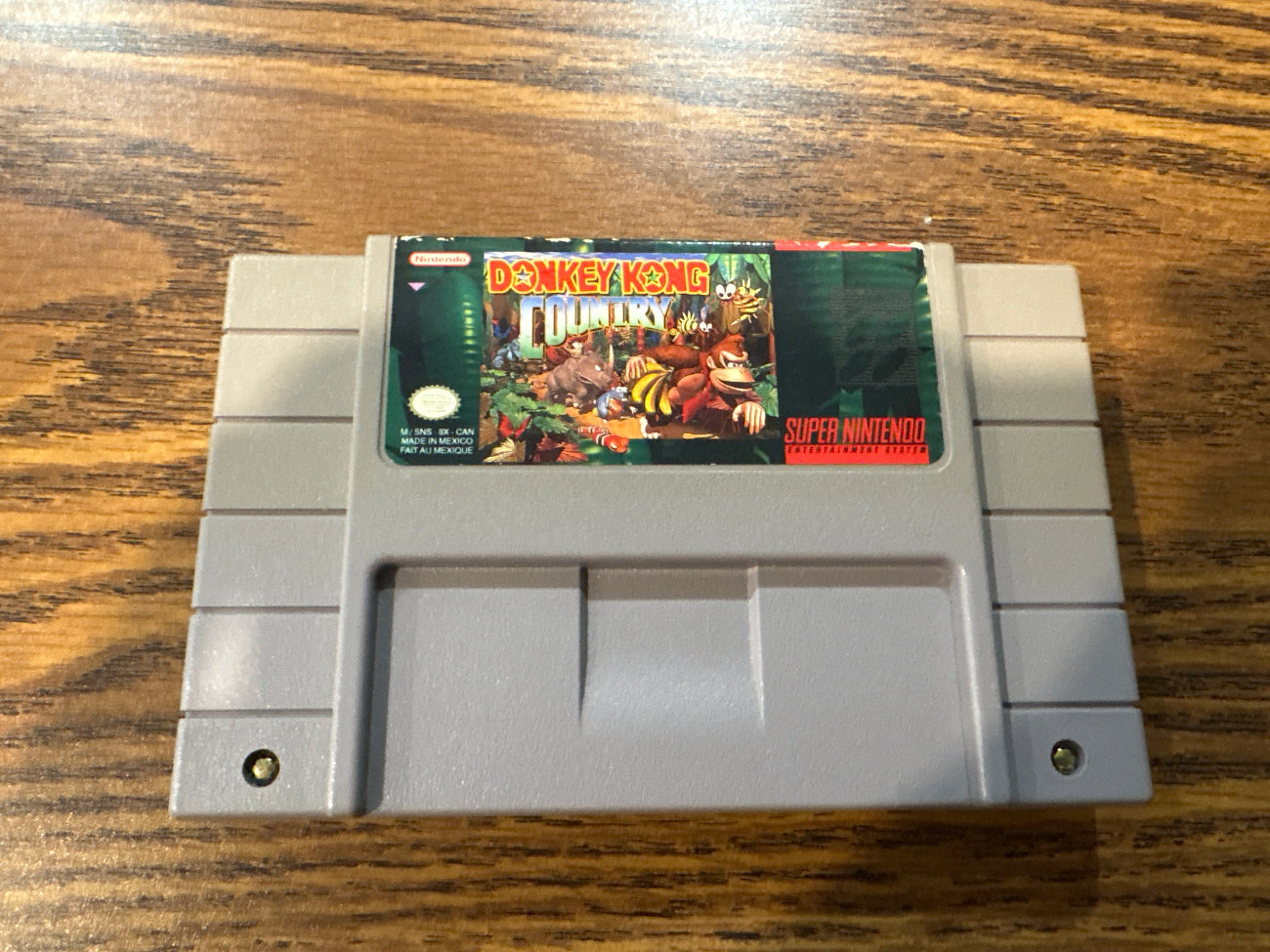 Donkey Kong Country Super Nintendo Entertainment System game cartridge