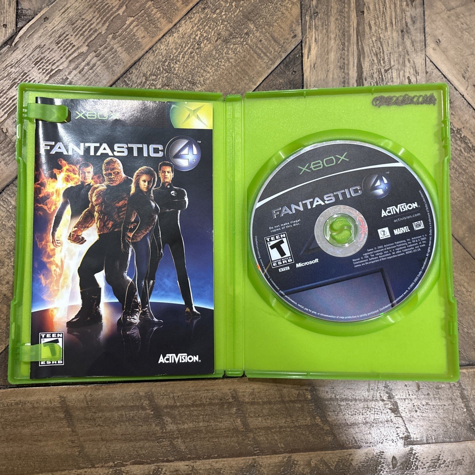 Inside of Fantastic 4 Xbox game case