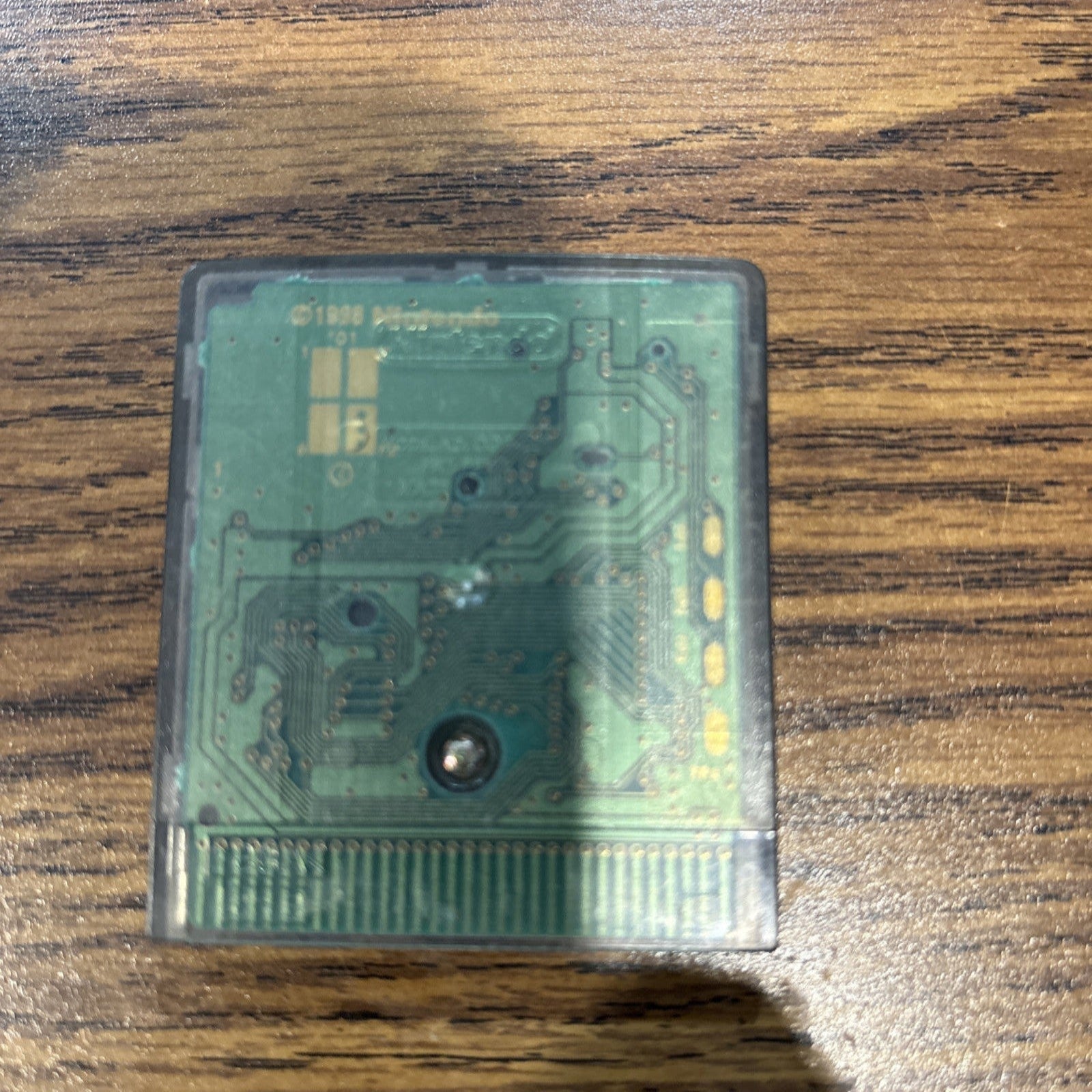 Back of Legend of Zelda Oracle of Seasons Game Boy Color game cartridge