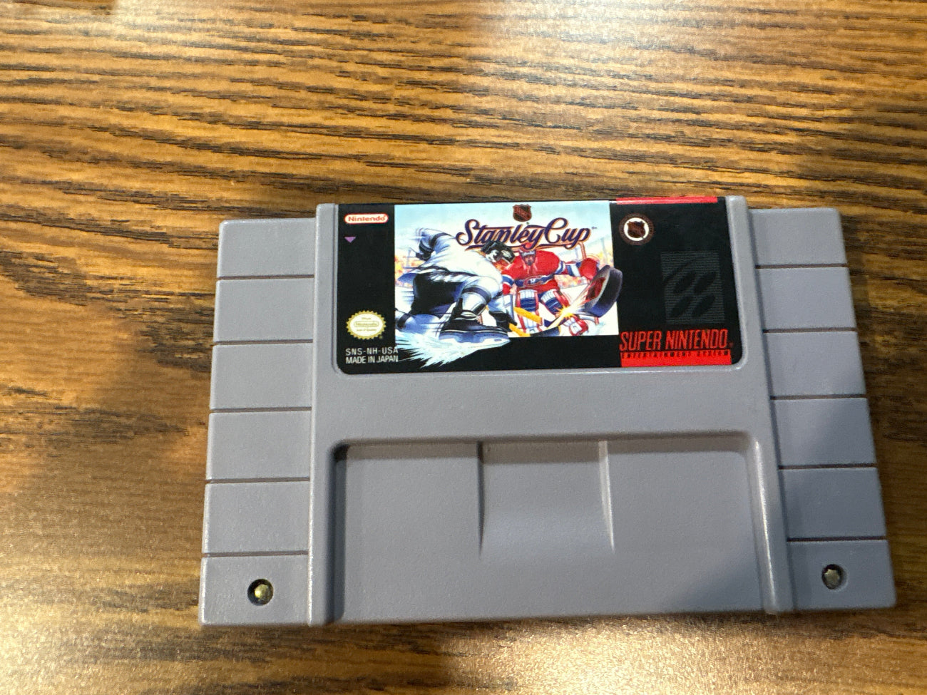 Super Nintendo Entertainment System game cartridge for NHL Stanley Cup