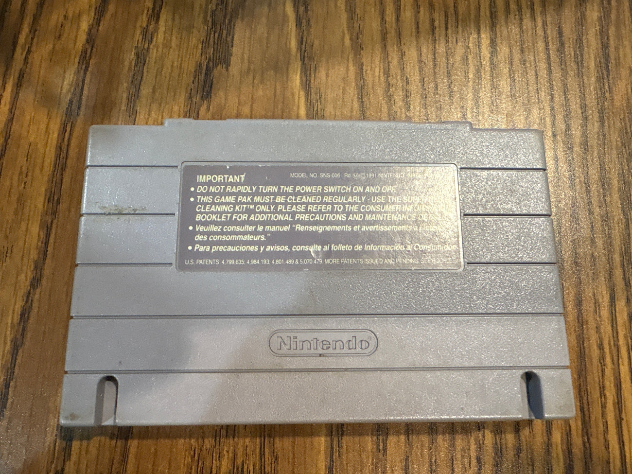 Back of Super Mario World Super Nintendo game cartridge