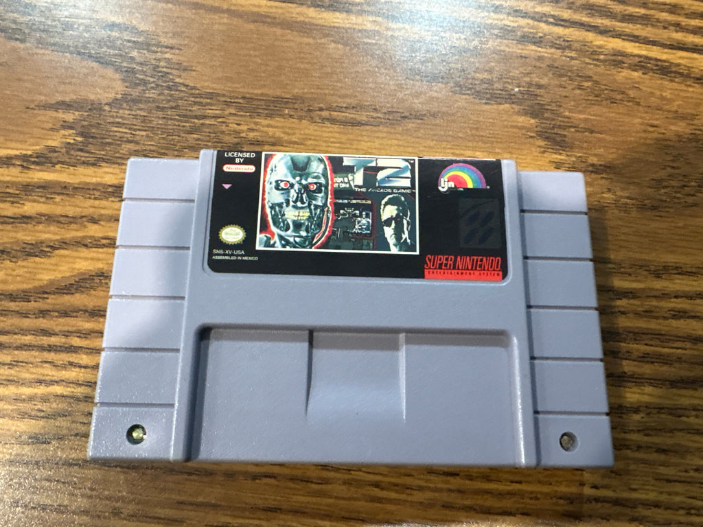 Super Nintendo Entertainment System game cartridge of T2 The Arcade Game