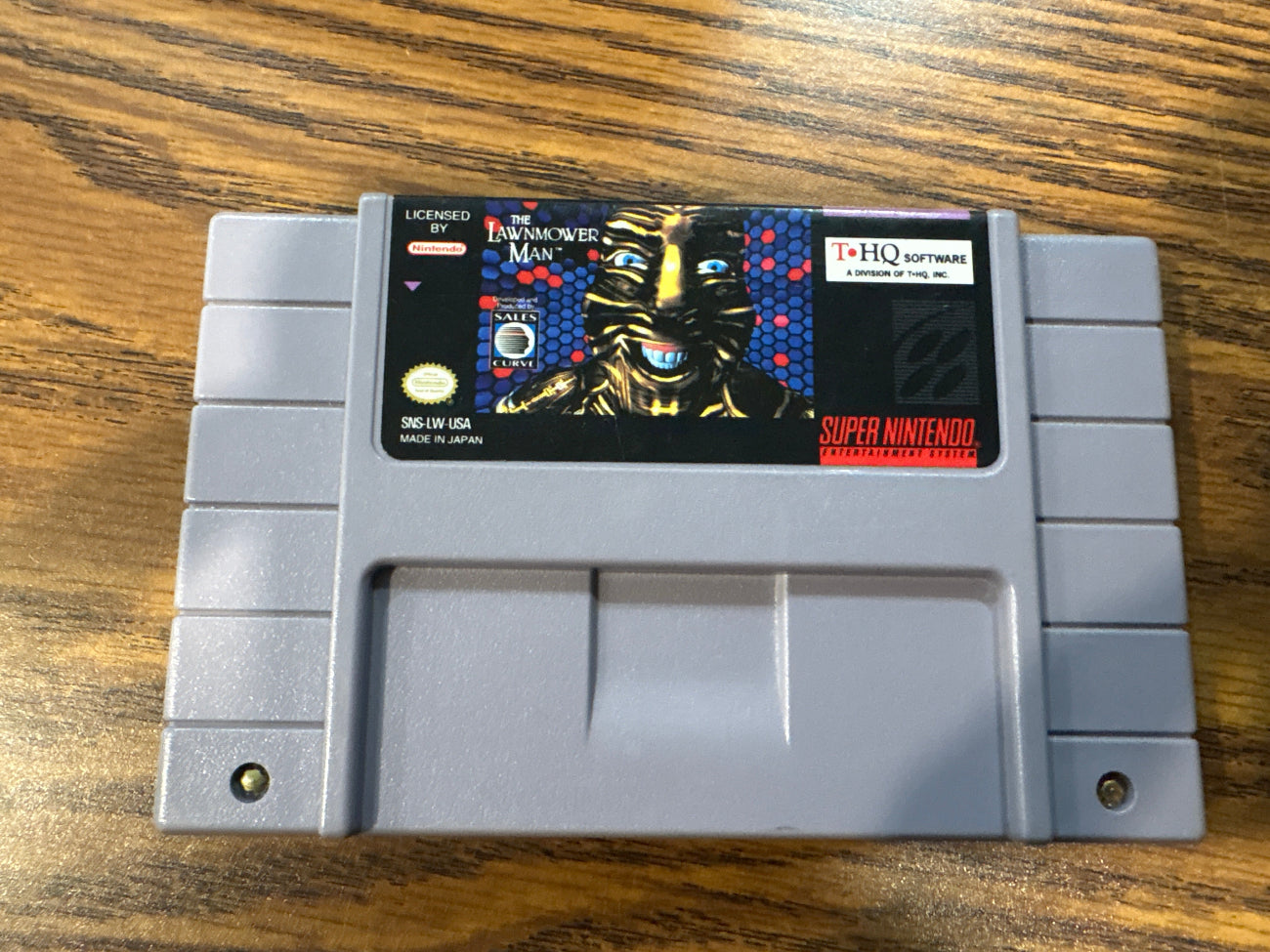 Super Nintendo Entertainment System game cartridge for The Lawnmower Man
