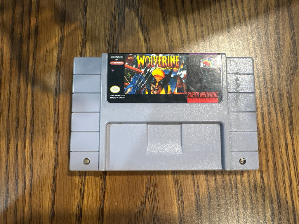 SNES game cartridge of Wolverine adamantium rage